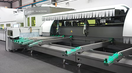 Unloading platform on both sides of the machine